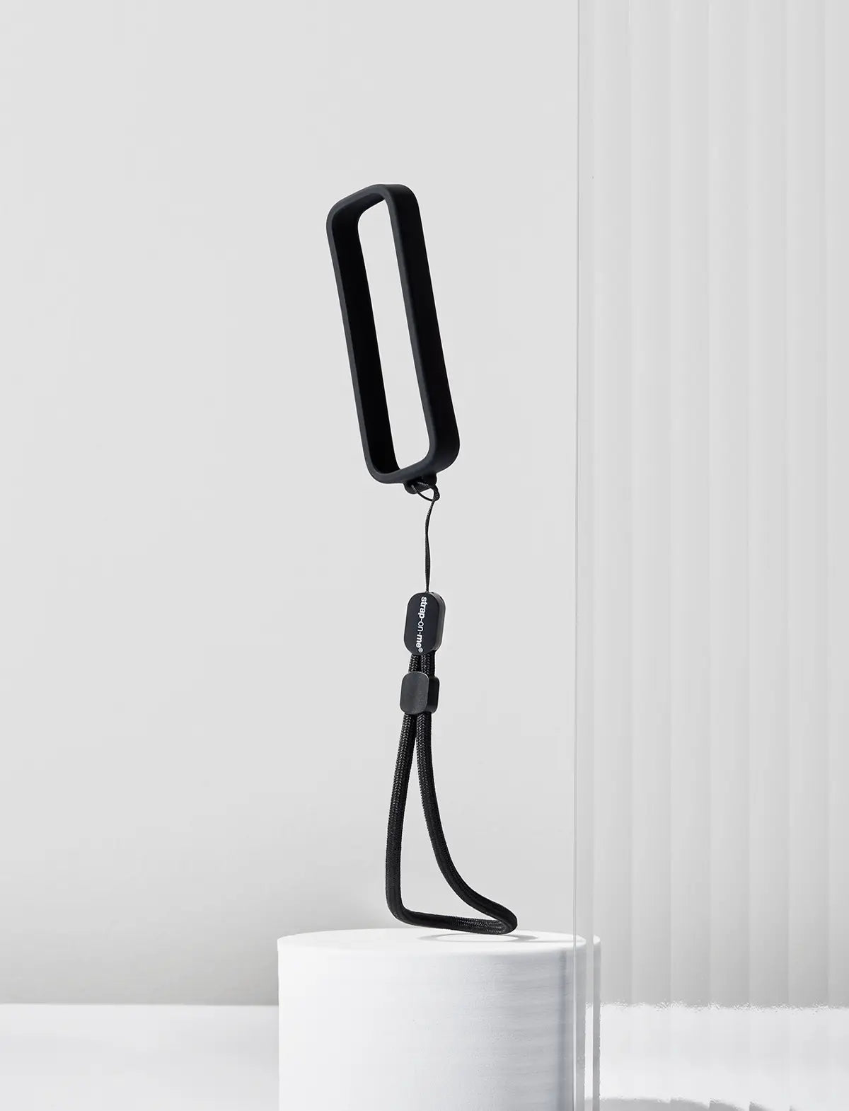 Strap-on-Me remote control attachment designed for secure fastening and convenient hands-free use