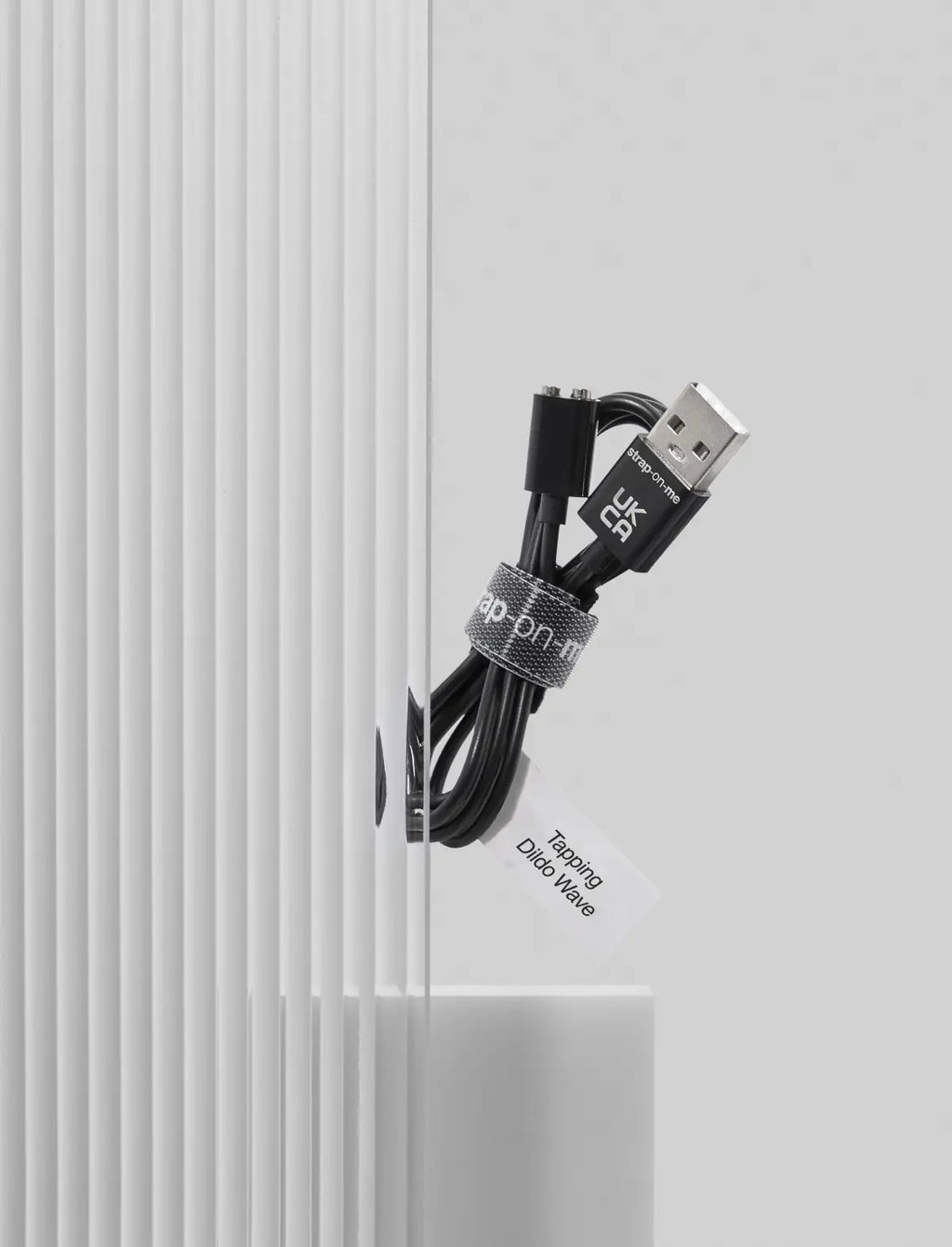 Magnetic USB charger Strap-on-Me designed for Wave tapping dildo with secure connection and easy charging convenience