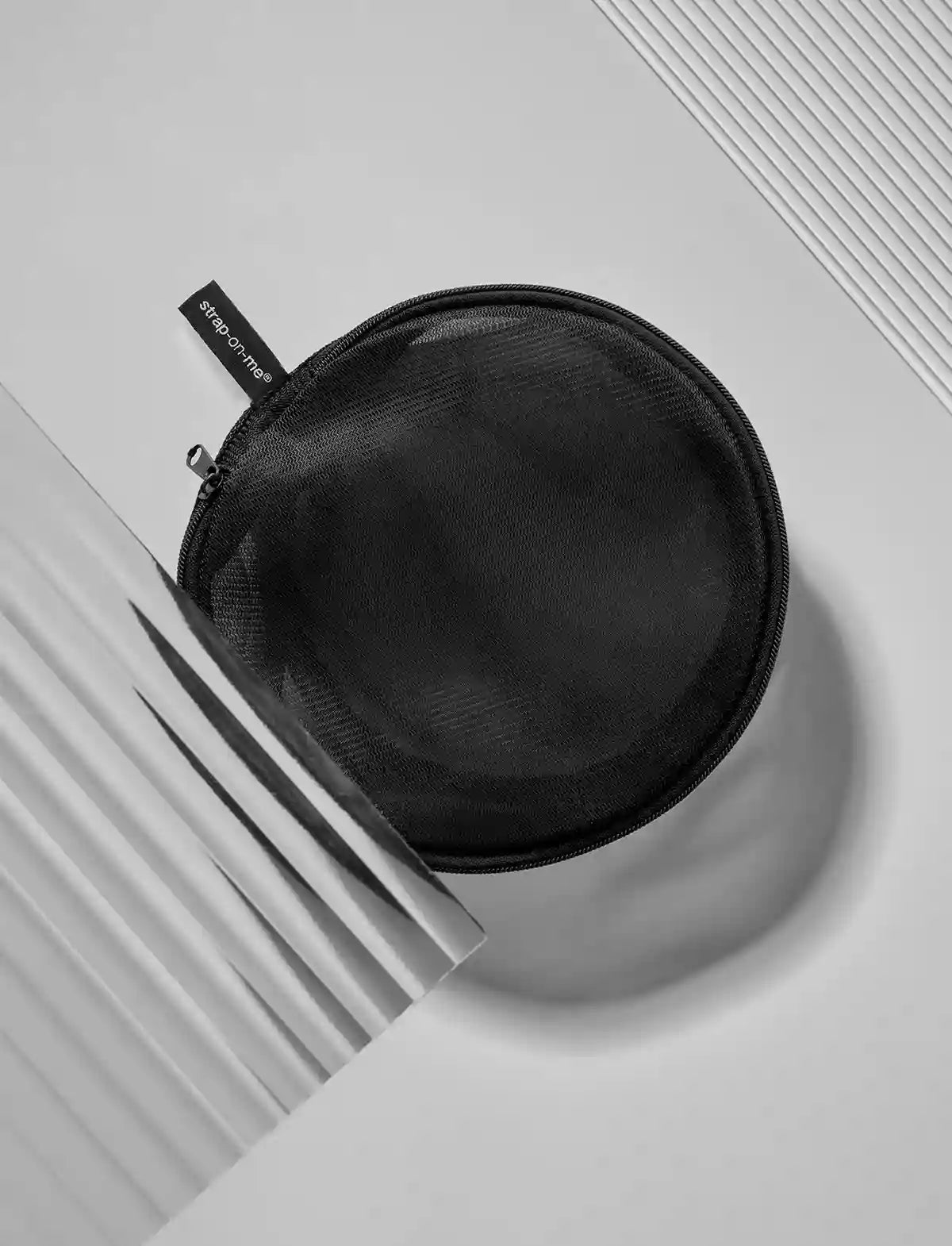 Strap-on-Me wash pouch designed for storing and protecting products while keeping them clean and discreet