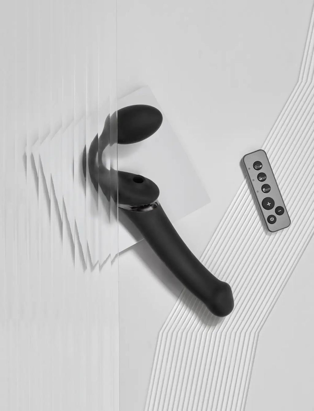 Multi-orgasm vibrating strap-on with remote control, 3 motors, rechargeable remote, black design, Strap-On-Me collection.
