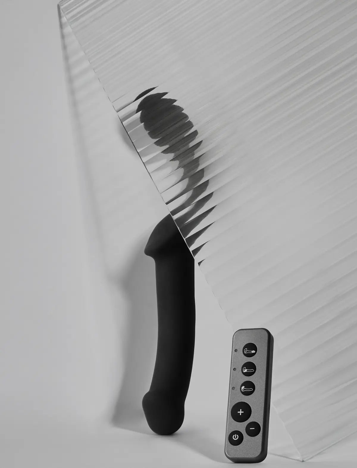 Vibrating strap-on with remote control, 3 motors, rechargeable remote, black design, Strap-On-Me collection.