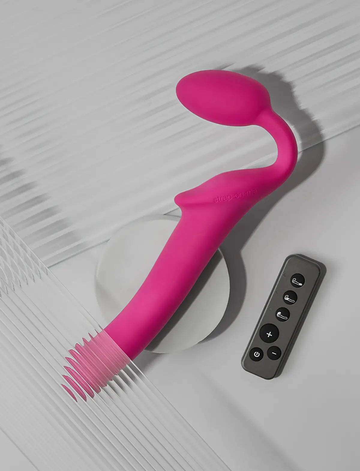 Vibrating strap-on with remote control, 3 motors, rechargeable remote, fuchsia design, Strap-On-Me collection.